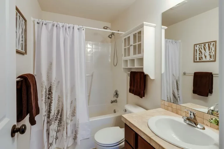 Should Your Shower Curtain Hang Inside the Tub? Pros & Cons